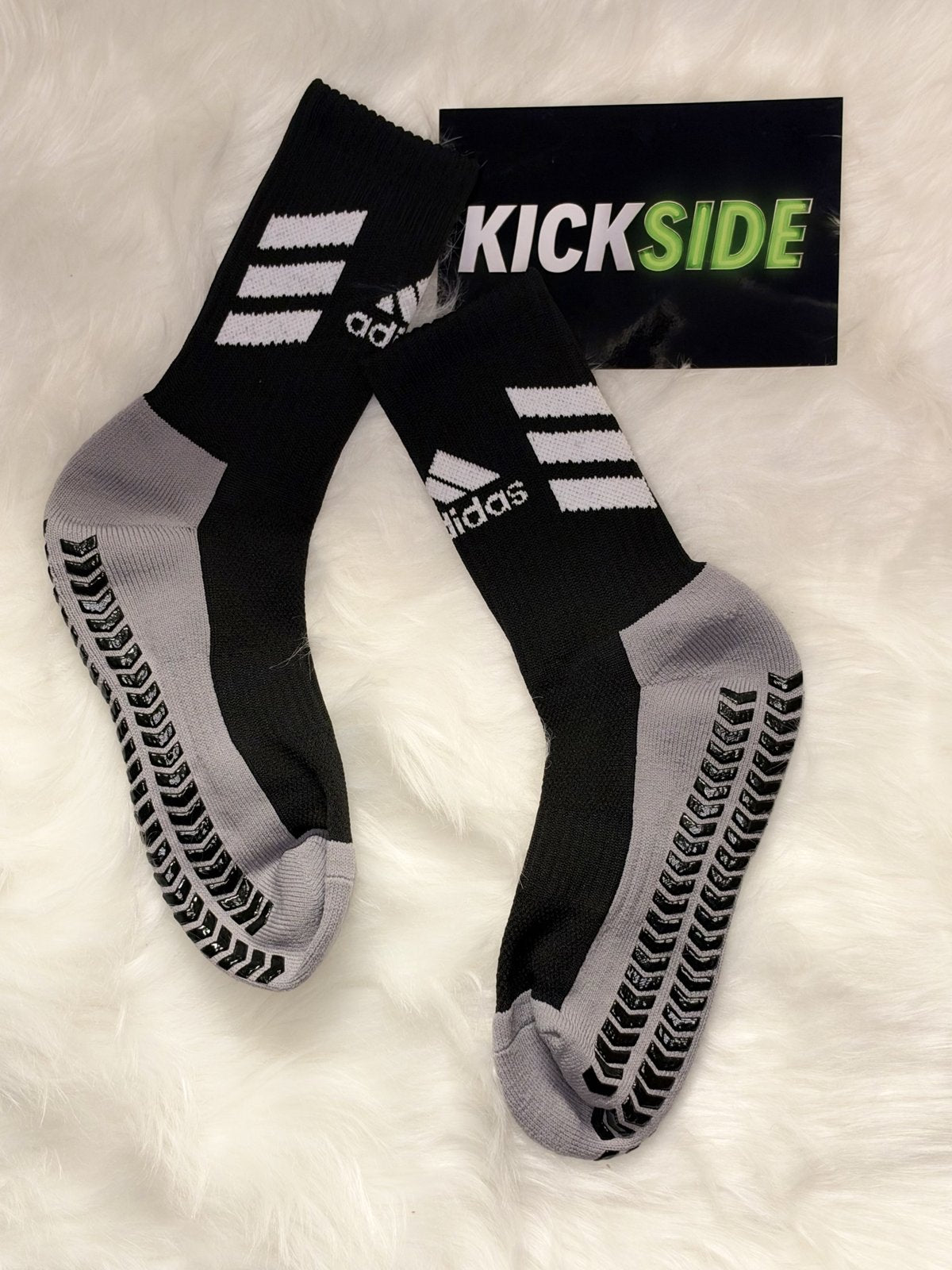 Black Adidas-style football grip socks with grey footbed and black grip pads